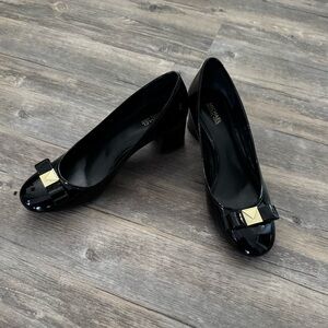 Beautiful condition. Caroline mid-heel pumps in black patent leather
